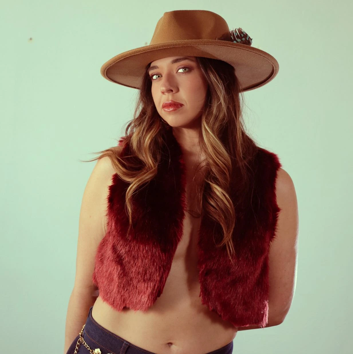 Chelsey Webb — tan hat, burgundy fur vest